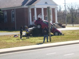 Cars Flips Over into Church Sign in Dundalk